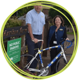 man and woman with bike